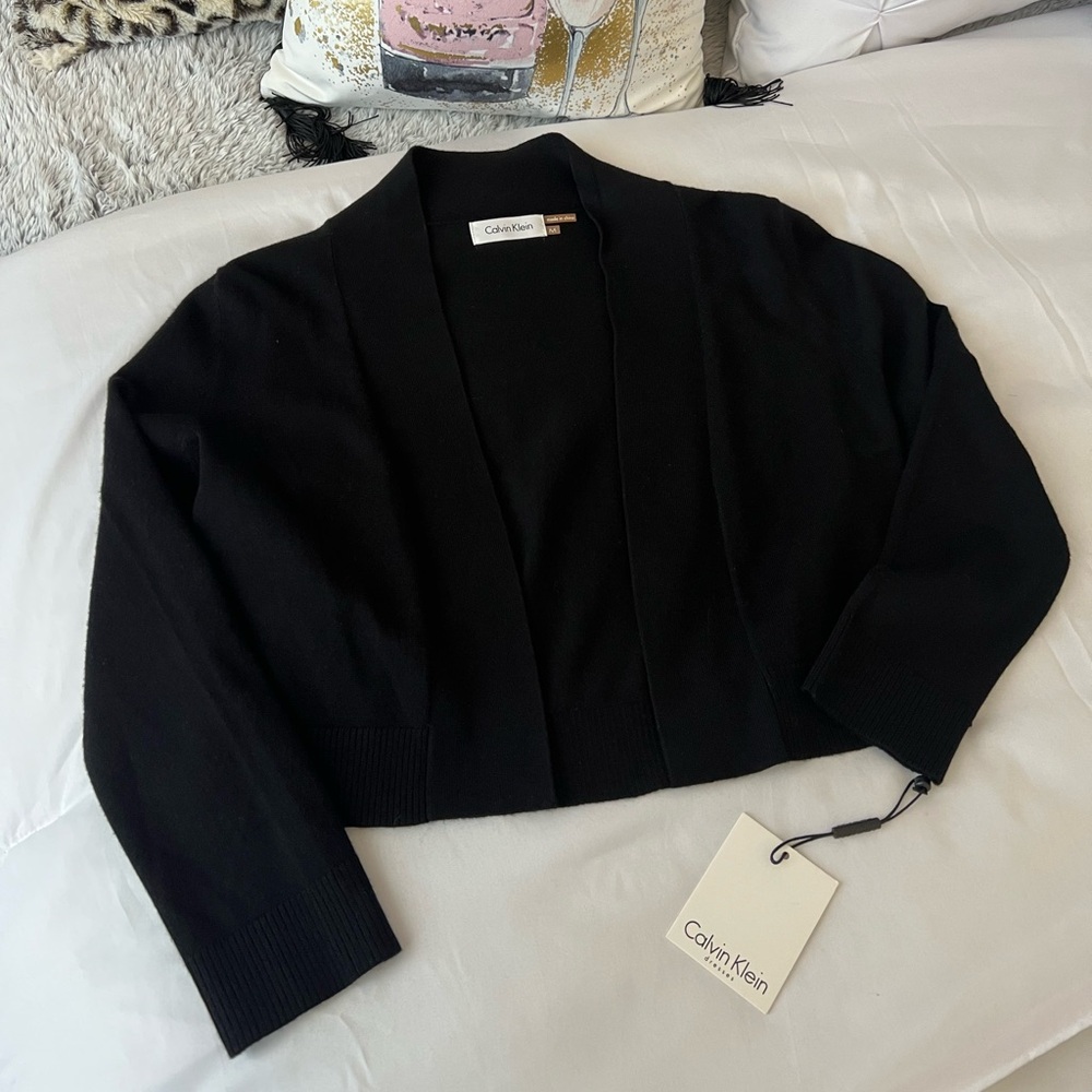 Calvin Klein 3/4 length
sleeve knit sweater/topper.